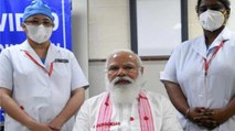 PM Modi wears Assamese gamucha as he takes Covaxin shot