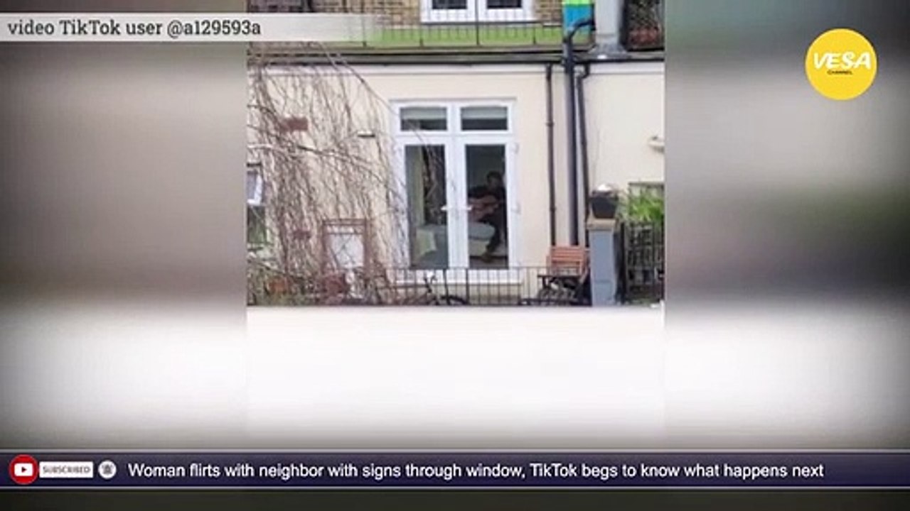 Woman flirts with neighbor with signs through window, TikTok begs to know what happens next