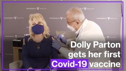 Dolly Parton gets her first Covid-19 vaccine