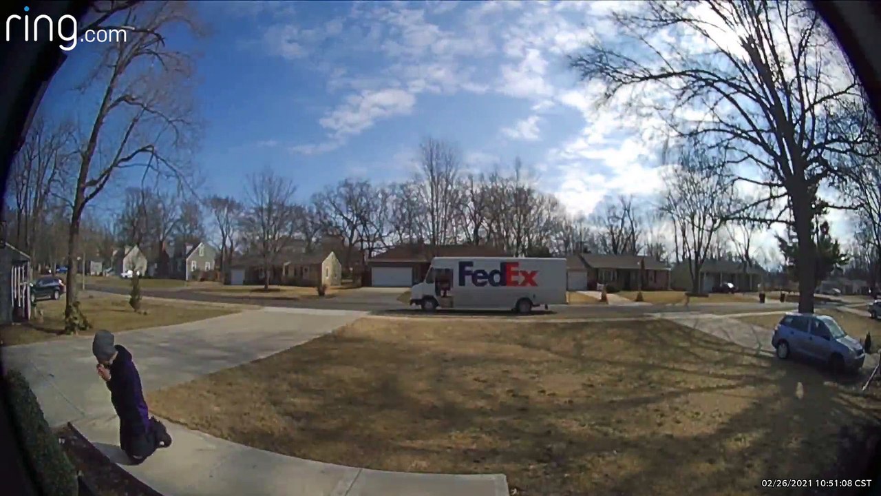 Delivery Man Stops to Pray at Virgin Mary Statue