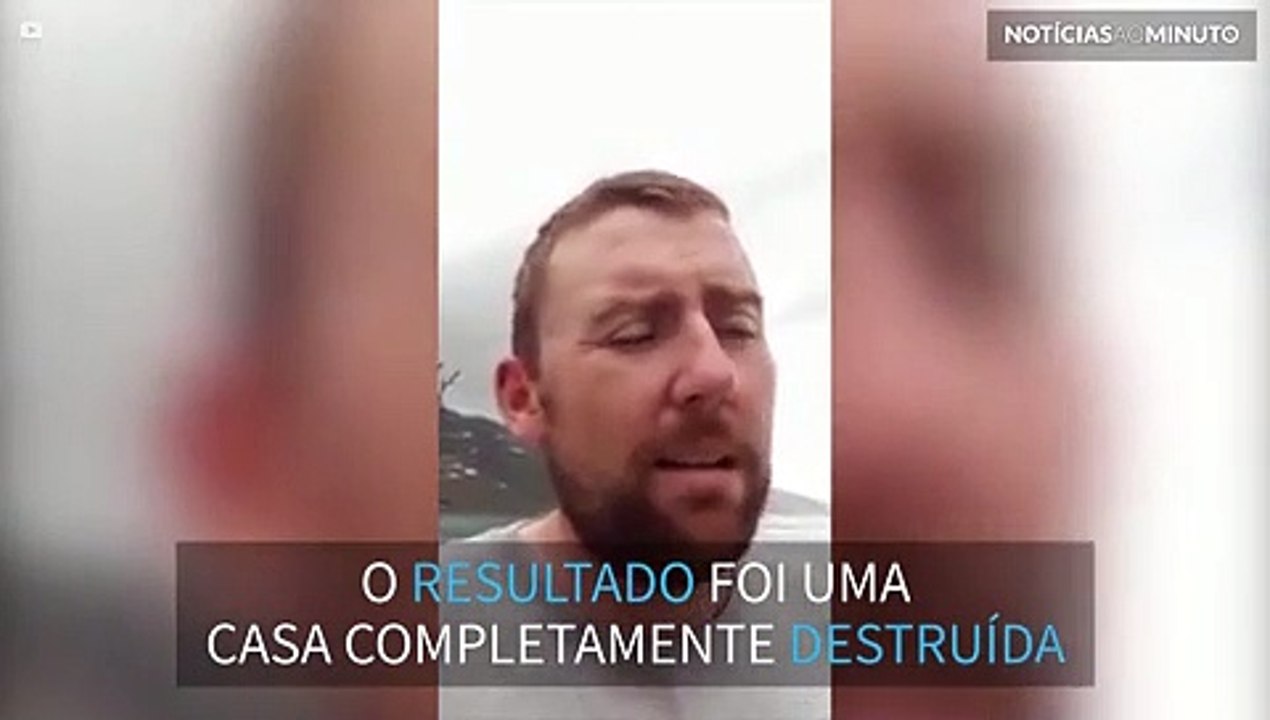 Mesmo com a casa de sonho destruída este homem continua otimista!