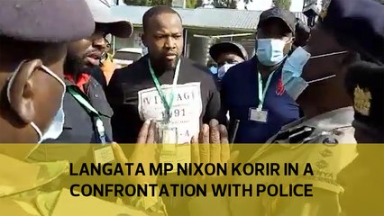 Langata MP Nixon Korir in a confrontation with a police officer