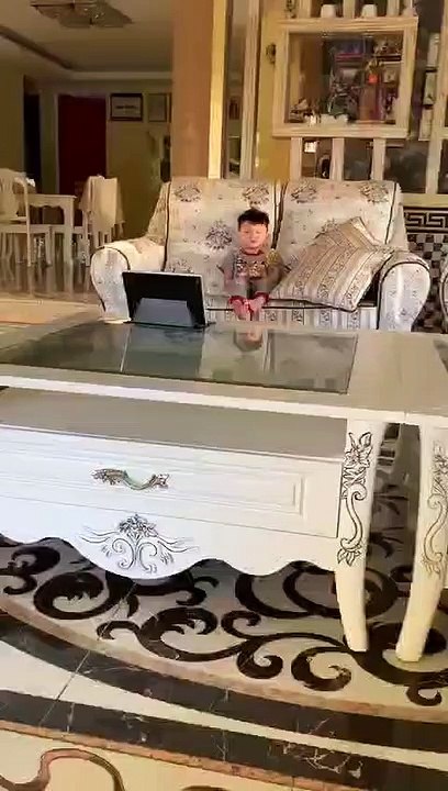 Baby see happy with cartoon