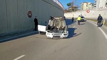 Takla atan otomobilden burnu bile kanamadan kurtuldu