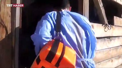 Bakan Koca, zor şartlarda aşılama yapan sağlıkçıların görüntüsünü paylaştı