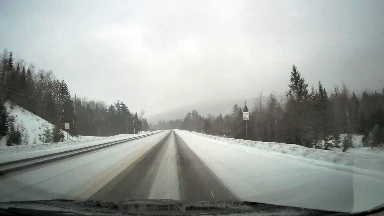 18 Wheeler Whips Around on Icy Road