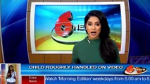 Caught on Tape: child roughly handled on video