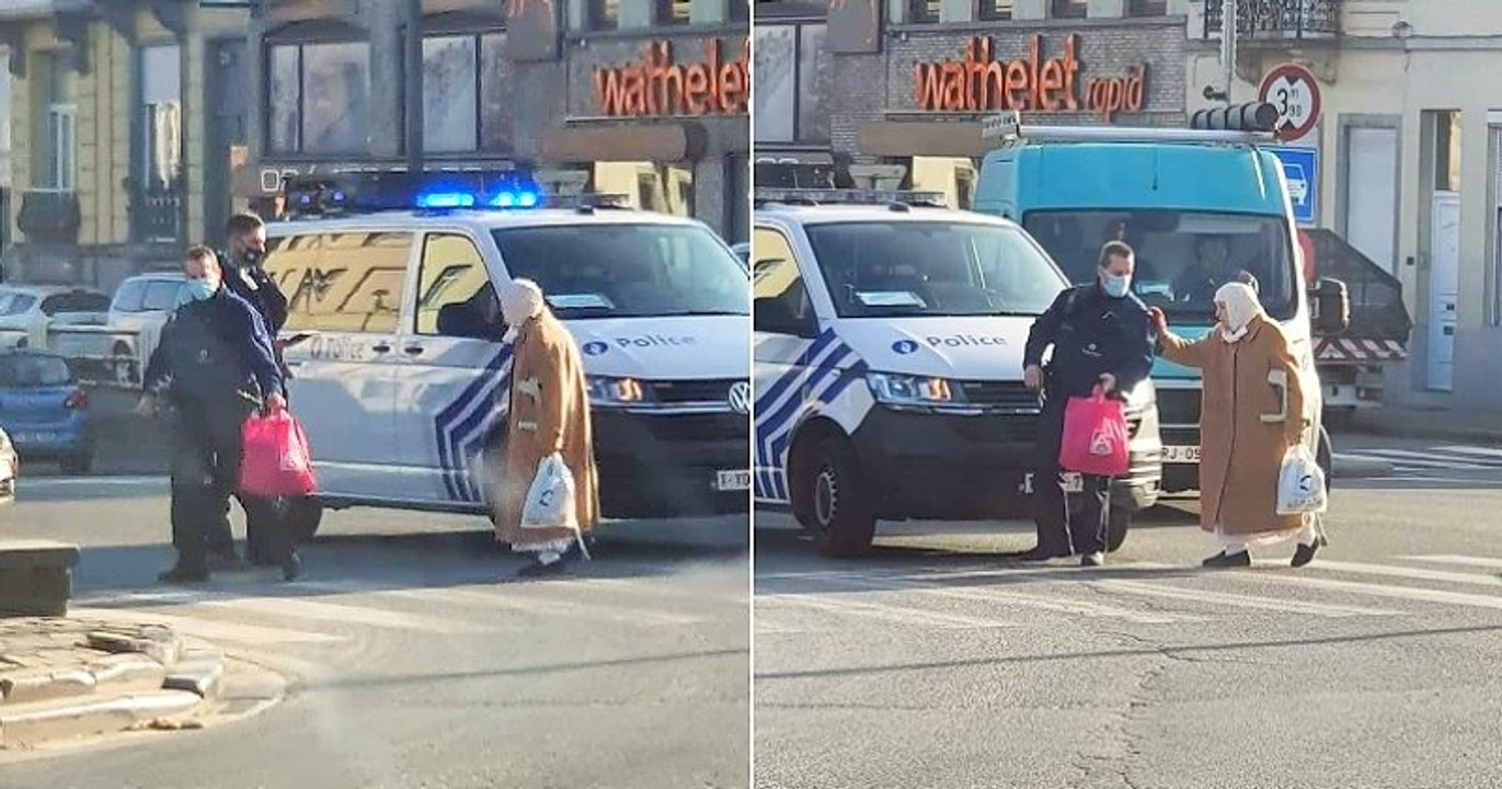 Bruxelles : les photos de policiers en train d'aider une vieille dame à traverser deviennent virales