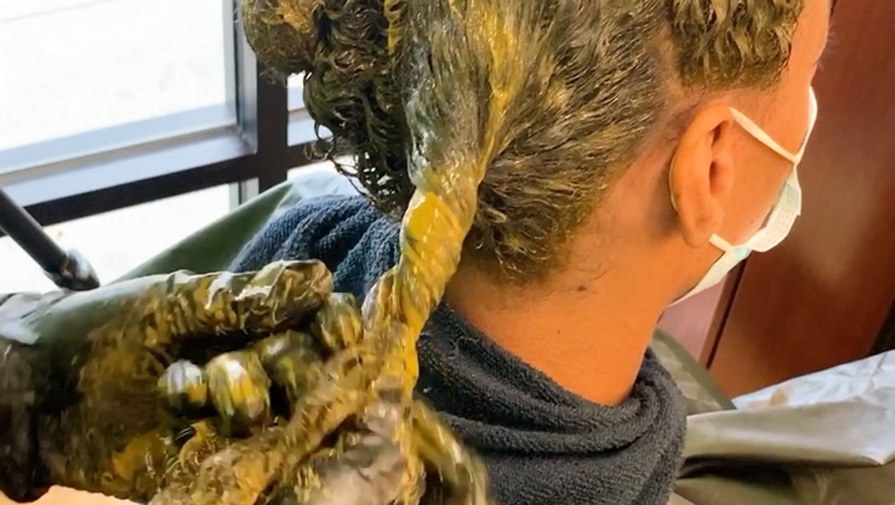 Try henna powder to naturally color hair