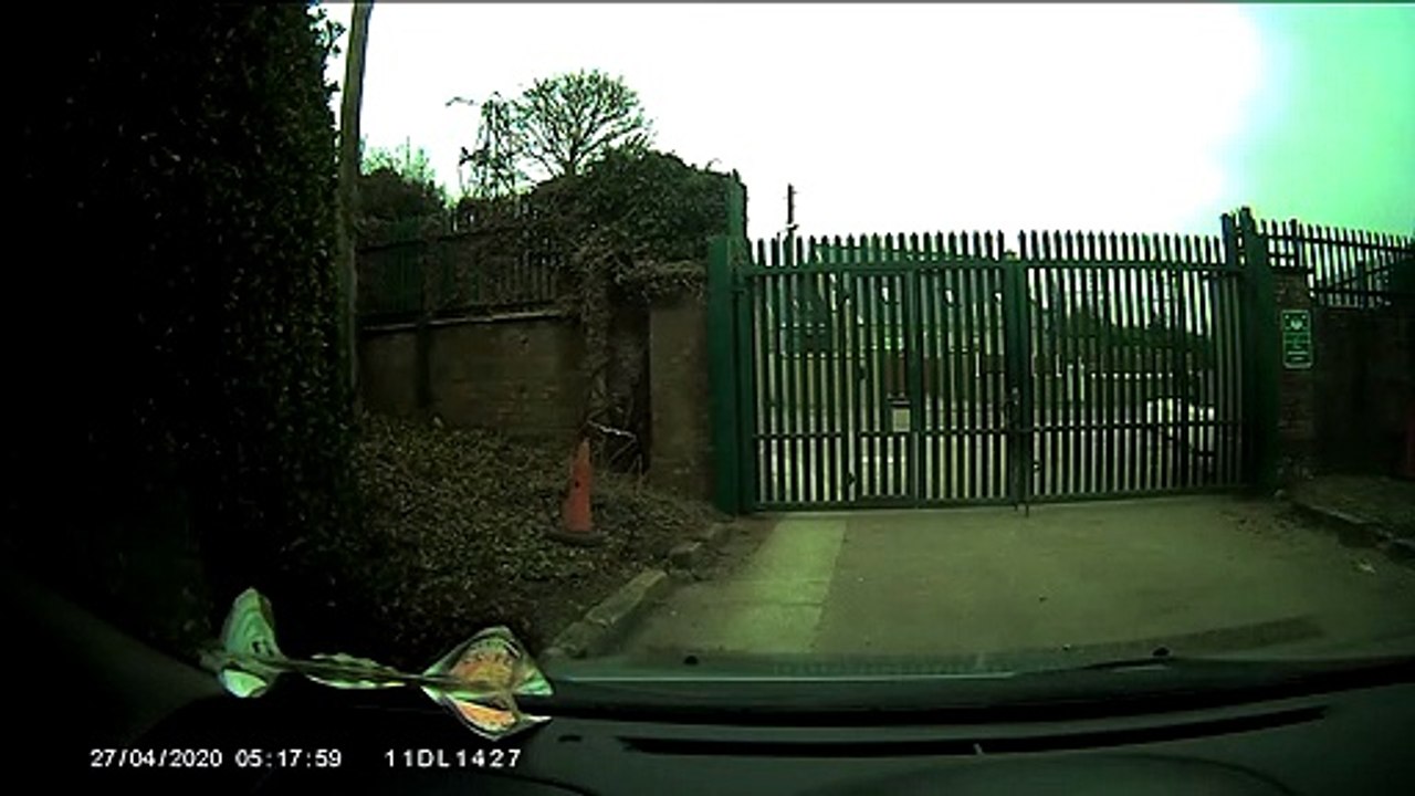 Car Rolls Away from Guy Getting Gate