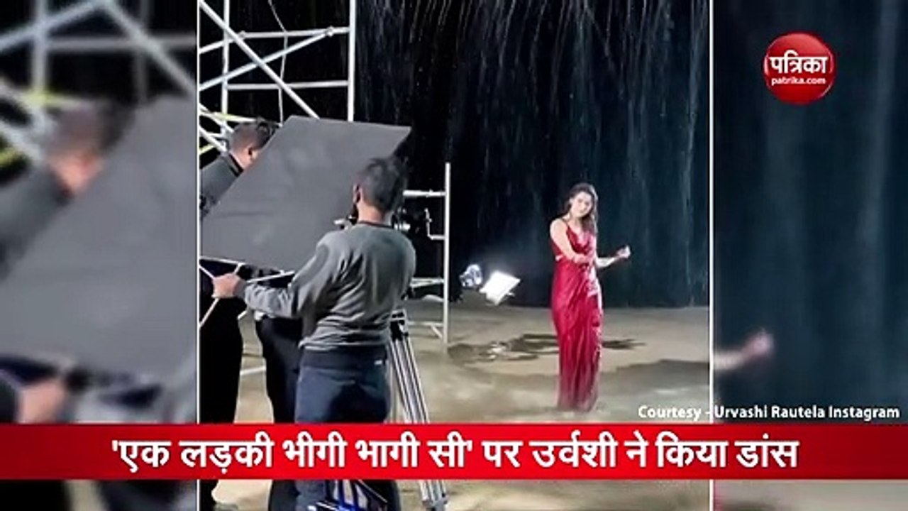 बारिश में रेड साड़ी में भीगते हुए उर्वशी रौतेला...
