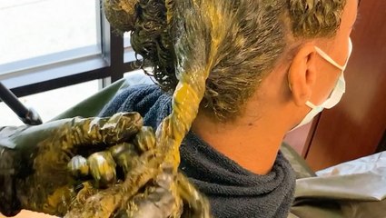 Try henna powder to naturally color hair