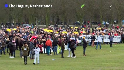 Clashes as police break up anti-government protest on eve of Dutch elections