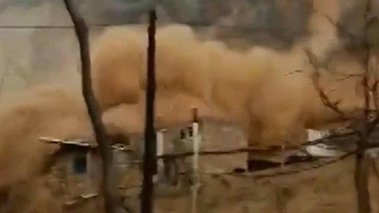 Landslide buries homes in China