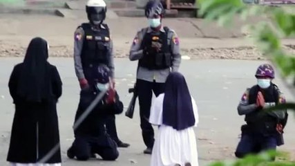 Watch: Nun kneels in front of police to stop Myanmar violence