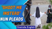 Myanmar: Nun kneels down, pleads armed forces to spare the ‘kids’ | Oneindia News