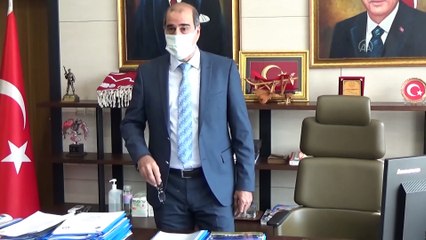 KAHRAMANMARAŞ - Yaşlı kadını yanan evden kurtaran bekçiye plaket verildi