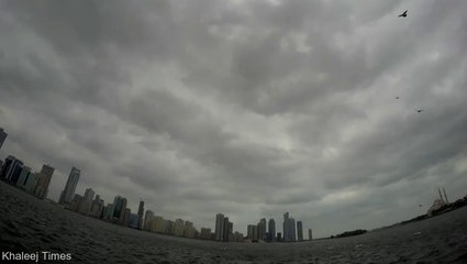 A blanket of clouds sweeps over Sharjah