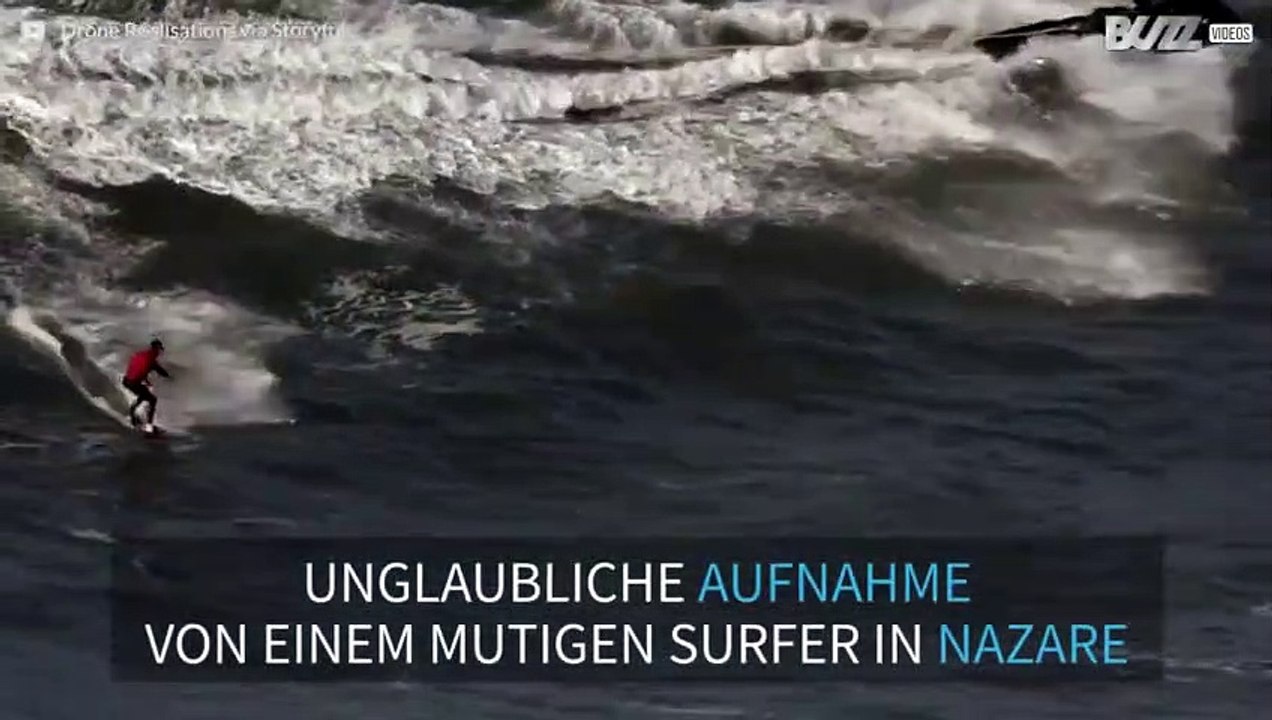 Surfer trifft auf die furchterregenden Wellen von Nazare