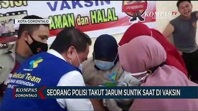 Seorang Polisi Takut Jarum Suntik Saat Di Vaksin
