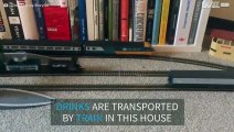 Toy train brings drinks from the kitchen to the couch