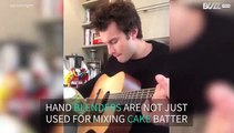 Guitarist plays 'Pulp Fiction' theme song with hand blender