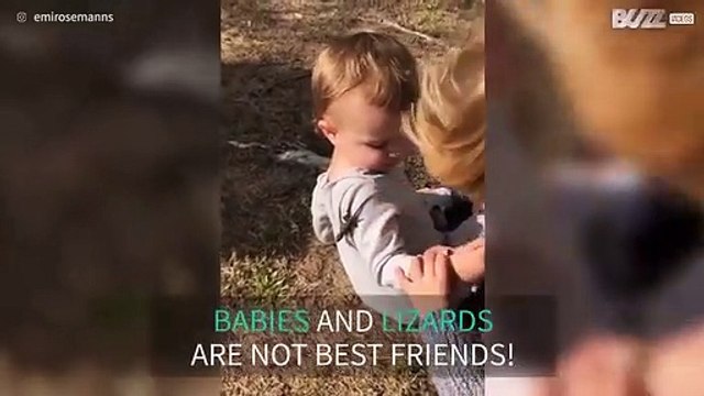 Baby freaks out when lizard climbs on him