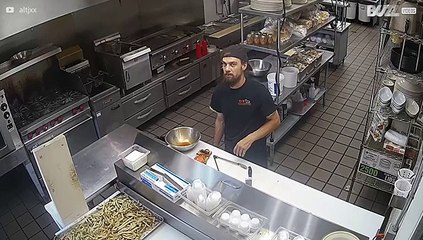 Security camera focuses on butter-fingered cook