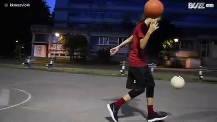 Youngster demonstrates basketball and soccer skills... at the same time!