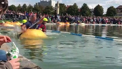 Man uses pumpkin as canoe!