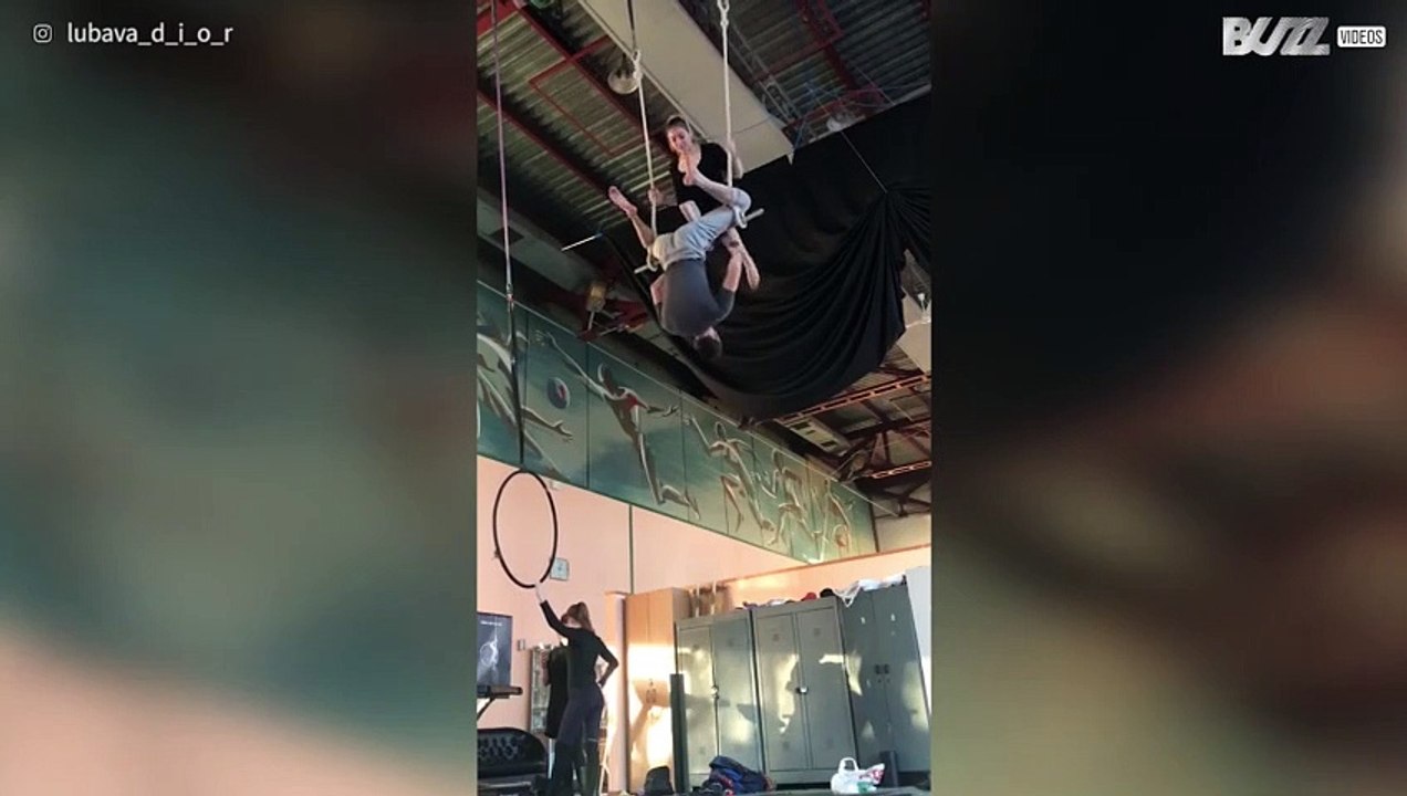 Trapeze artist in training makes huge fall