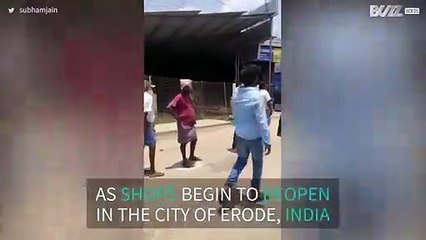 Huge queue in India respects social distancing regulations