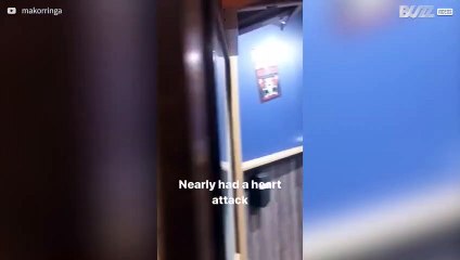 Young man is tricked by toilet door sign