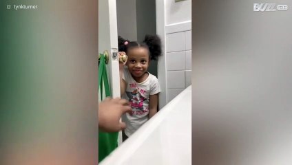 Little girl slow to realize she has fake poop in her hand!