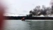 Kayak Rescues Fisherman from Burning Boat || ViralHog