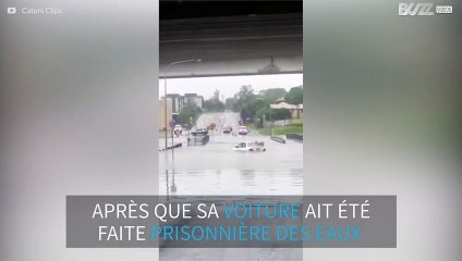 Une femme est secourue de sa voiture prisonnière des eaux