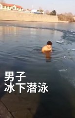 Man swims under ice and misses the hole then his friends rescue him from under the ice