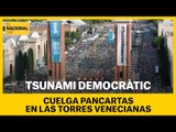 'Tsunami Democràtic' penja pancartes a les Torres Venecianes