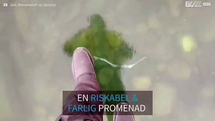 Den här killen tar en stor risk för att filma en fryst sjö