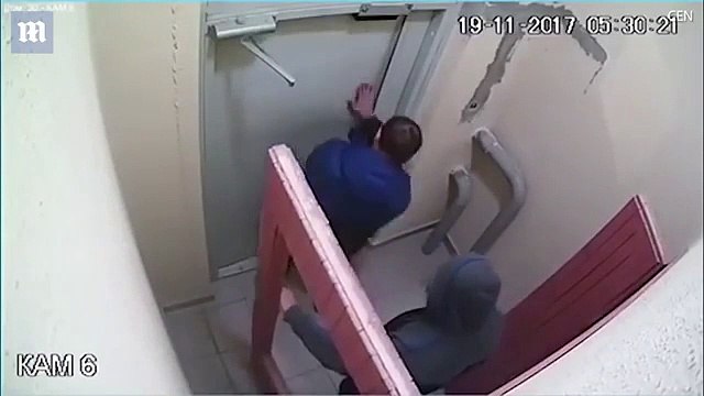 Hilarious moment drunk spends THREE hours kicking door down