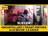 Els CDR encartellant i tirant pintura a la seu de 'La Caixa' de Girona
