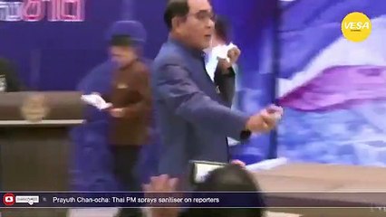 Thai PM sprays sanitiser on reporters