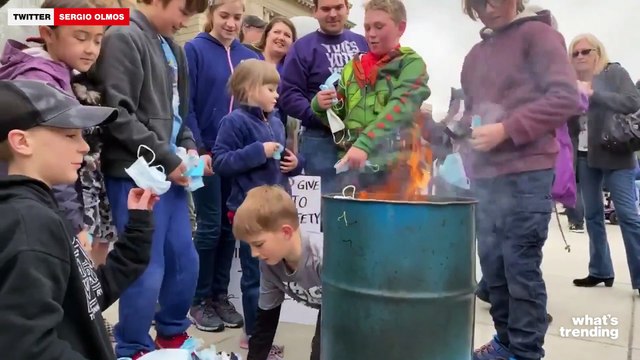 Disturbing Video Shows Anti-Mask Parents Encouraging Kids to Burn Masks