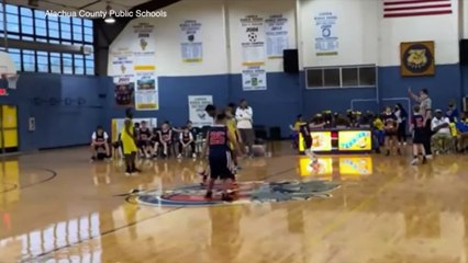 Child with Down's Syndrome sinks three pointer in final game