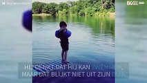 Mislukte duik: kleine jongen valt plat op zijn buik in een rivier