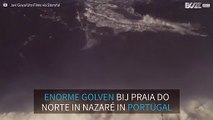 Sebastian Steudtner surft op een enorme golf in Portugal