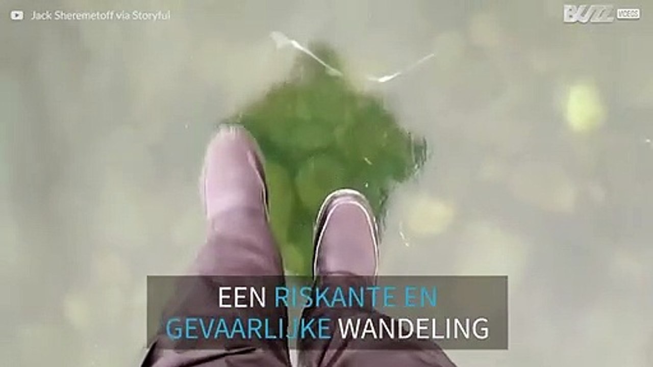 Deze kerel neemt een groot risico om een bevroren meer te filmen
