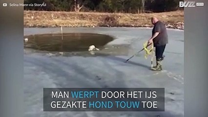 Hond zakt door ijs en weet zich met touw te redden
