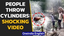 Gas Cylinder price hike: Citizens throw cylinder in the pond, video goes viral | Oneindia News