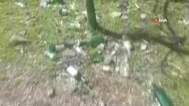 Boş araziye bırakılan içki şişeleri pes dedirtti